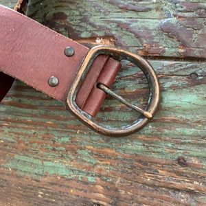 Brown tooled belt